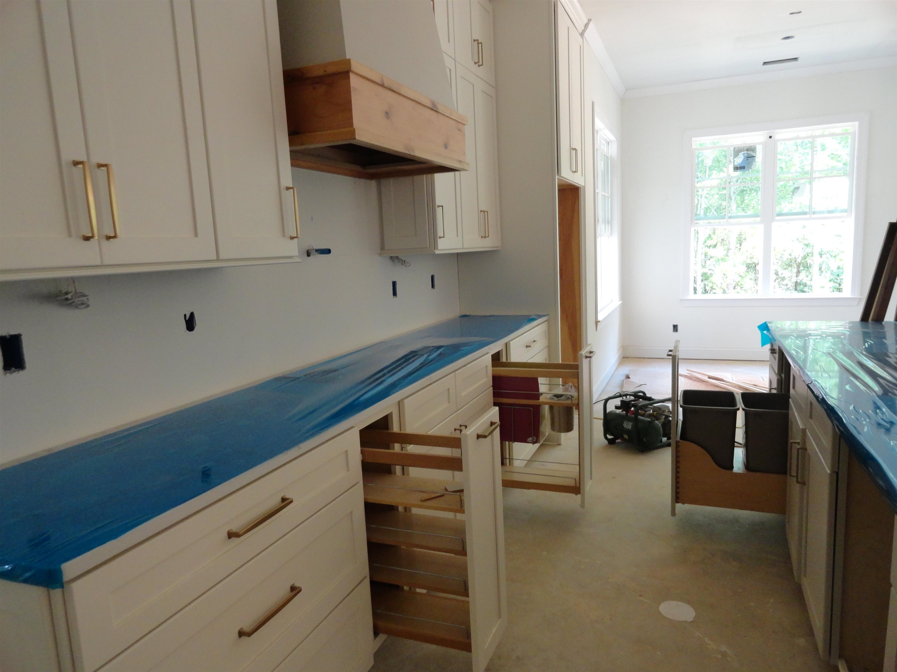 12671 Miss Cloud Road Collierville, TN 38017 - Photo 8 of 23 a kitchen with stainless steel appliances cabinets and a table