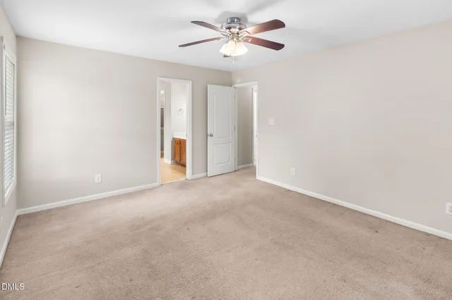 a view of a big room with carpet