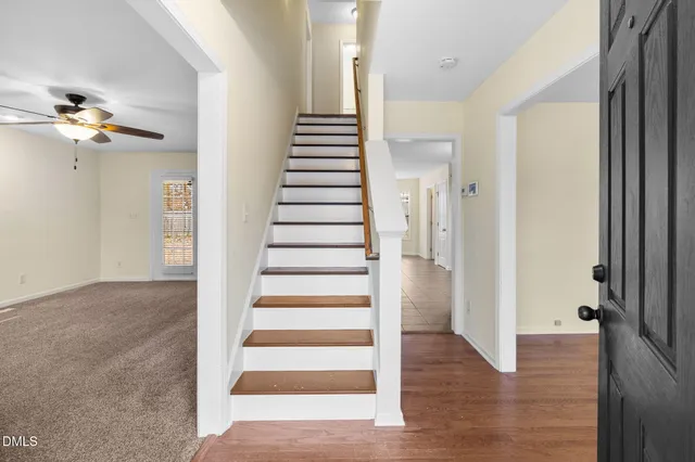 a view of entryway with wooden floor