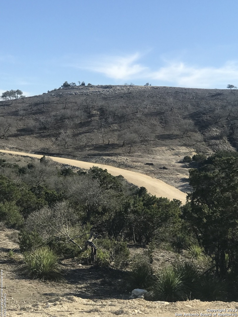 Lot 49 Elk Mountain Road Pipe Creek, TX 78063 - Photo 4 of 4 a view of a lake view and mountain view