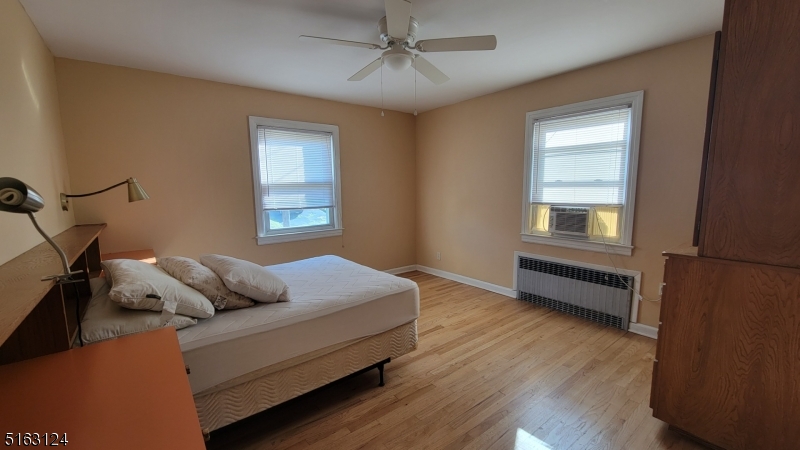 18 Howard Place, Unit 1 Nutley, NJ 07110 - Photo 10 of 17 a bedroom with bed and window