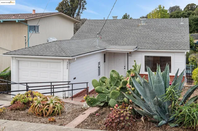 a bathroom with a sink toilet and mirror