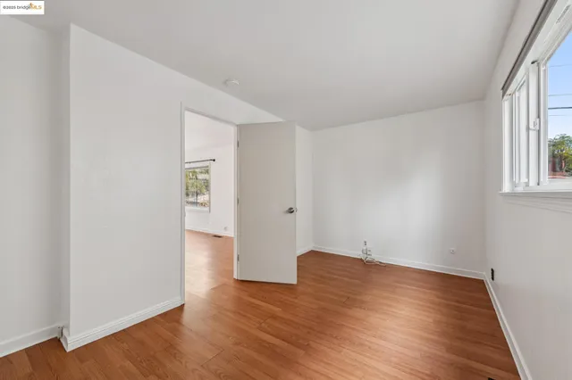 a view of a balcony with an outdoor seating