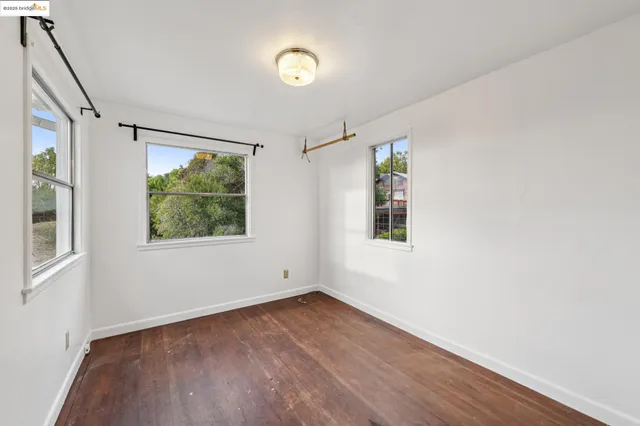 a room with furniture and flat screen tv