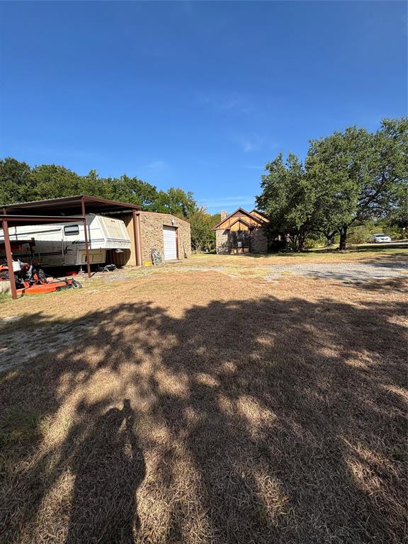 7210 Shiloh Road Midlothian, TX 76065 - Photo 7 of 15 View of Carports and Workshop in relation to house from the East.