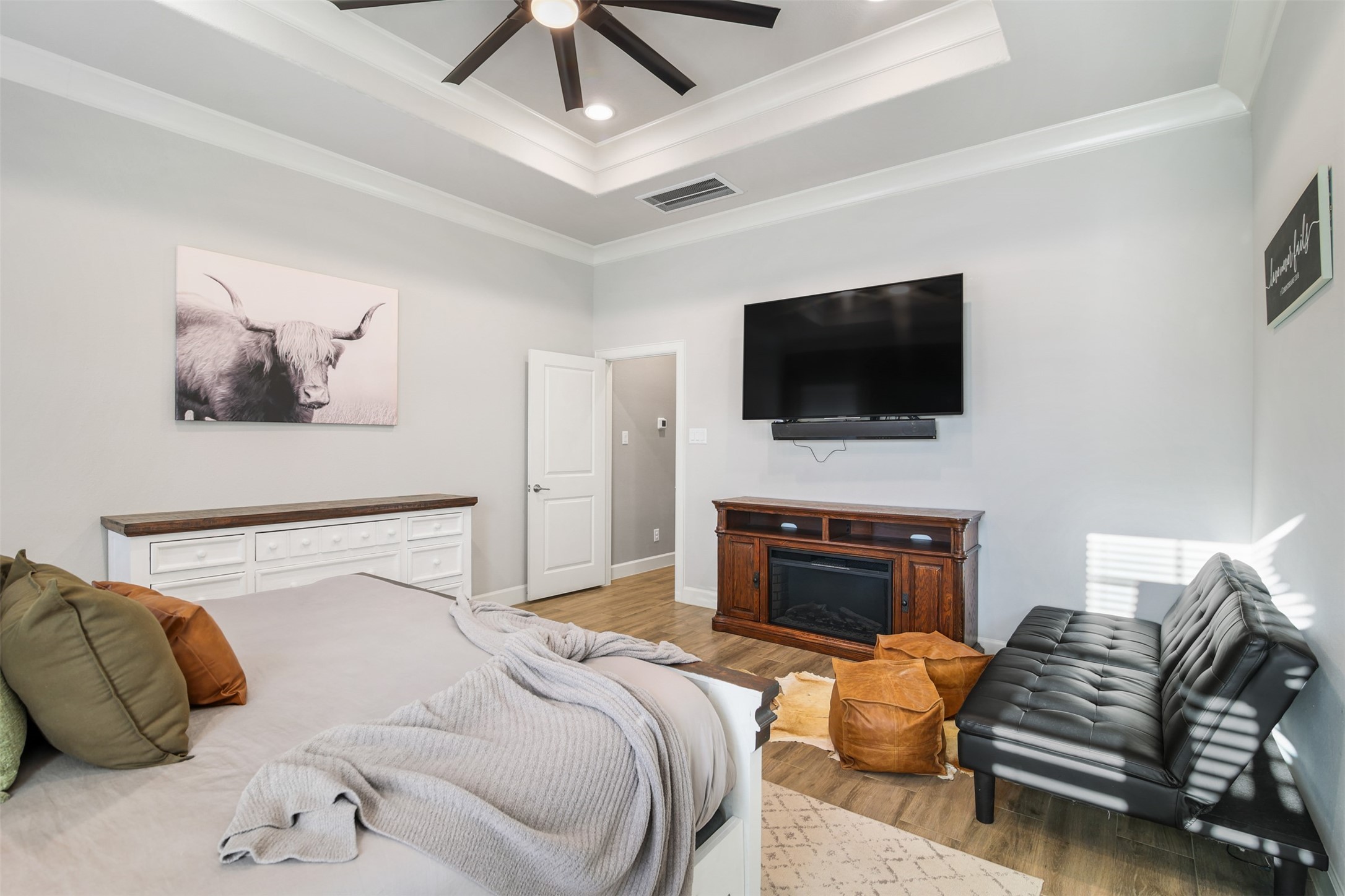 4219 Cross Cut Cleveland, TX 77328 - Photo 12 of 34 a bedroom with a bed and a flat screen tv