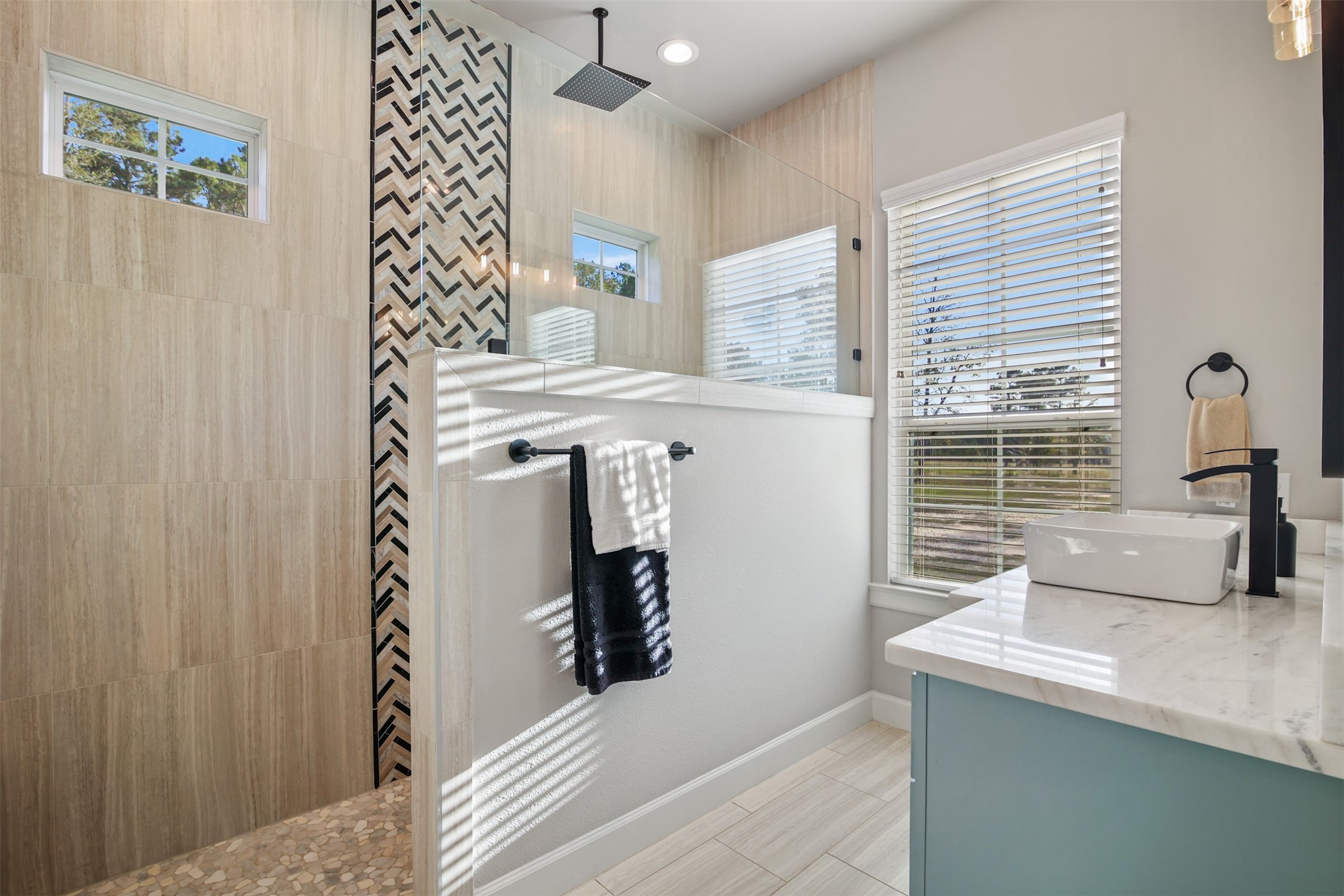 4219 Cross Cut Cleveland, TX 77328 - Photo 14 of 34 a bathroom with a sink and a mirror