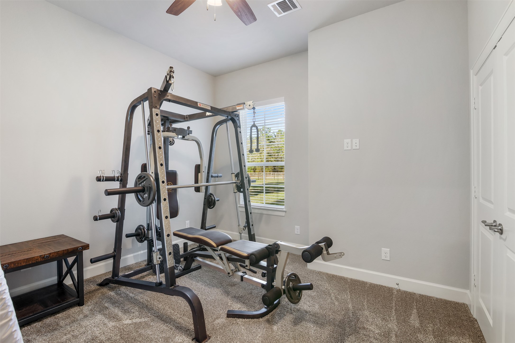 4219 Cross Cut Cleveland, TX 77328 - Photo 17 of 34 a view of a room with gym equipment