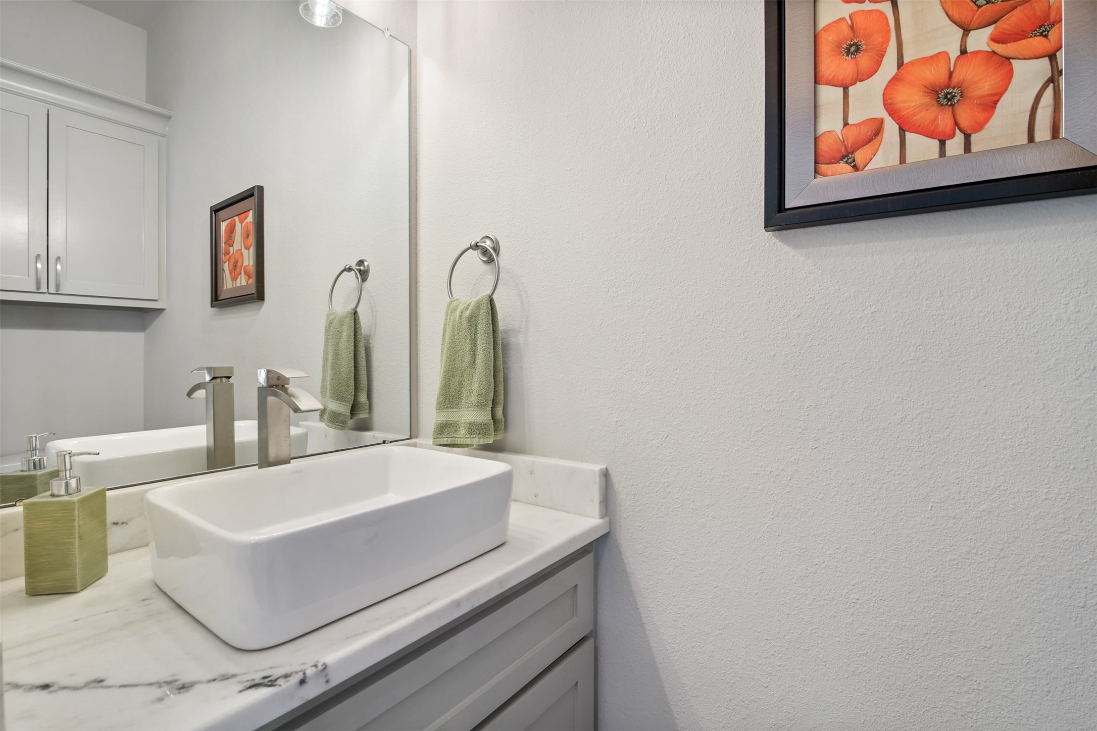 4219 Cross Cut Cleveland, TX 77328 - Photo 21 of 34 a bathroom with a sink and a mirror