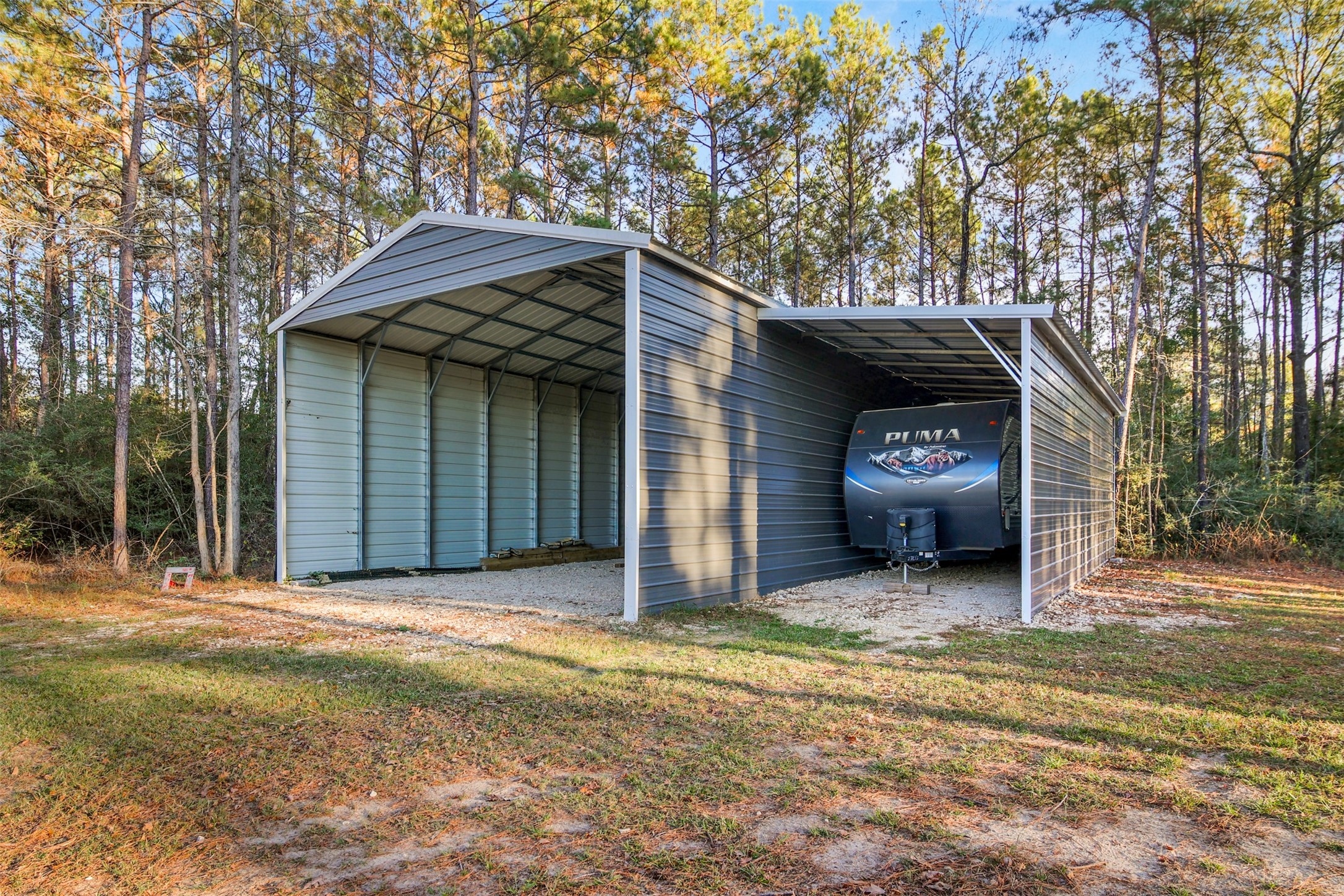 4219 Cross Cut Cleveland, TX 77328 - Photo 25 of 34 a view of a house with a yard and garage