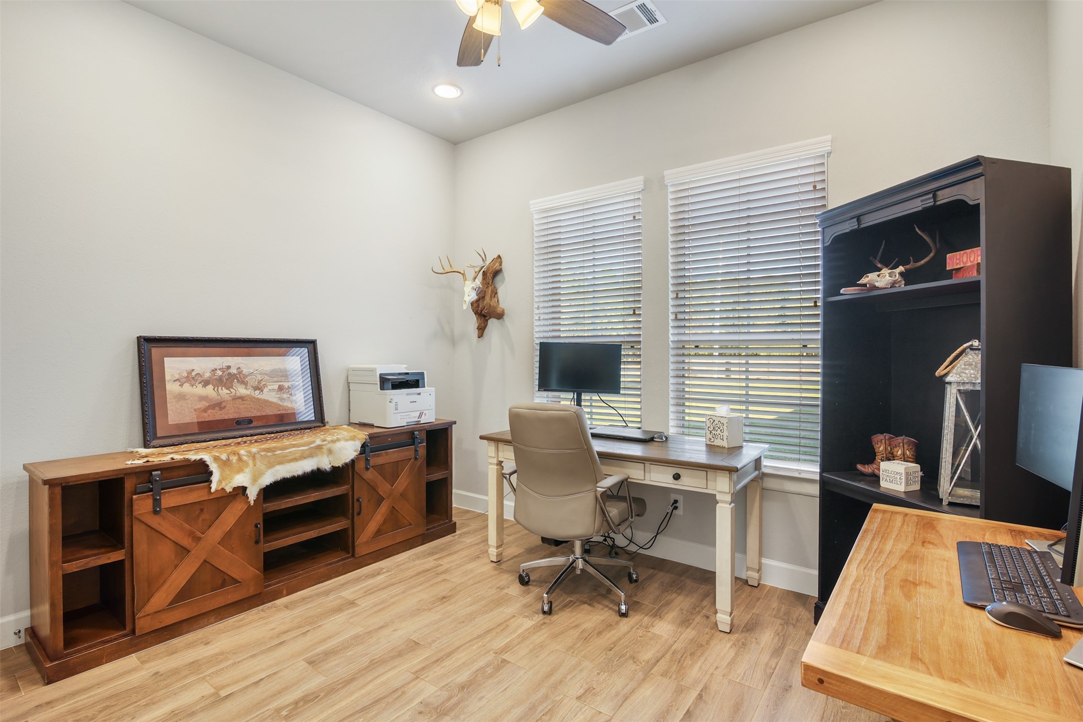 4219 Cross Cut Cleveland, TX 77328 - Photo 4 of 34 a workspace with furniture and wooden floor
