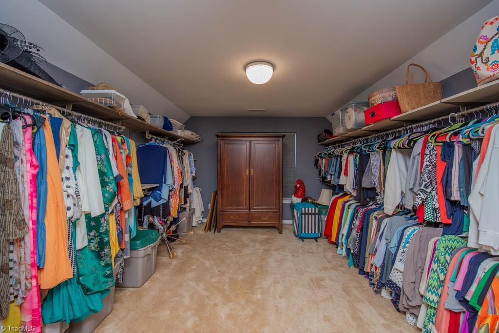3084 Sycamore Point Trail High Point, NC 27265 - Photo 24 of 33 This room over the garage is a closet fit for a queen...would make a terrific nursery too since there are his and hers closets in the primarty