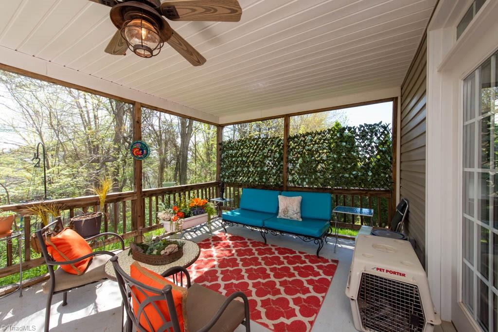 3084 Sycamore Point Trail High Point, NC 27265 - Photo 30 of 33 What a private screened porch
