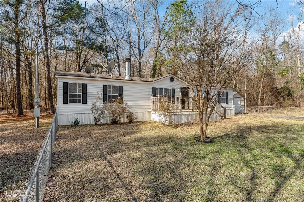 171 7 Pines Road Benton, LA 71006 - Photo 38 of 39 a view of a house with a yard