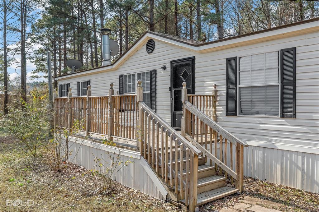171 7 Pines Road Benton, LA 71006 - Photo 39 of 39 a view of a house with iron fence
