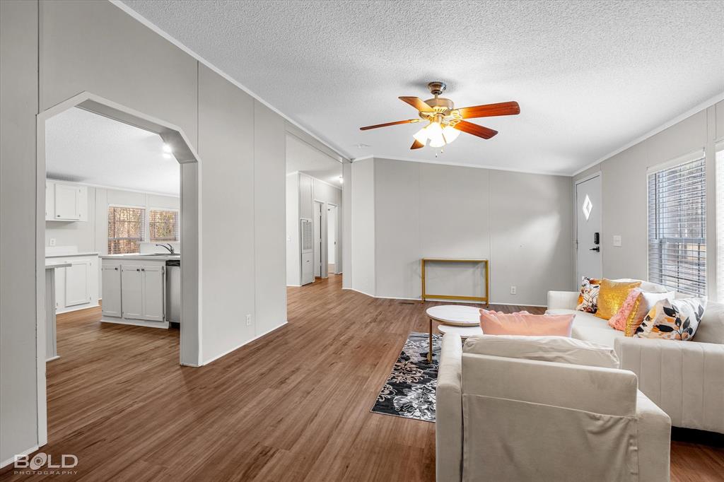 171 7 Pines Road Benton, LA 71006 - Photo 8 of 39 a bedroom with furniture and wooden floor