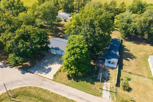 a view of swimming pool with outdoor seating and yard