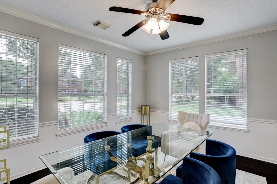 1611 Falcon Ridge Boulevard Friendswood, TX 77546 - Photo 3 of 11 View of the formal dining room, lots of windows that bring in the natural light.