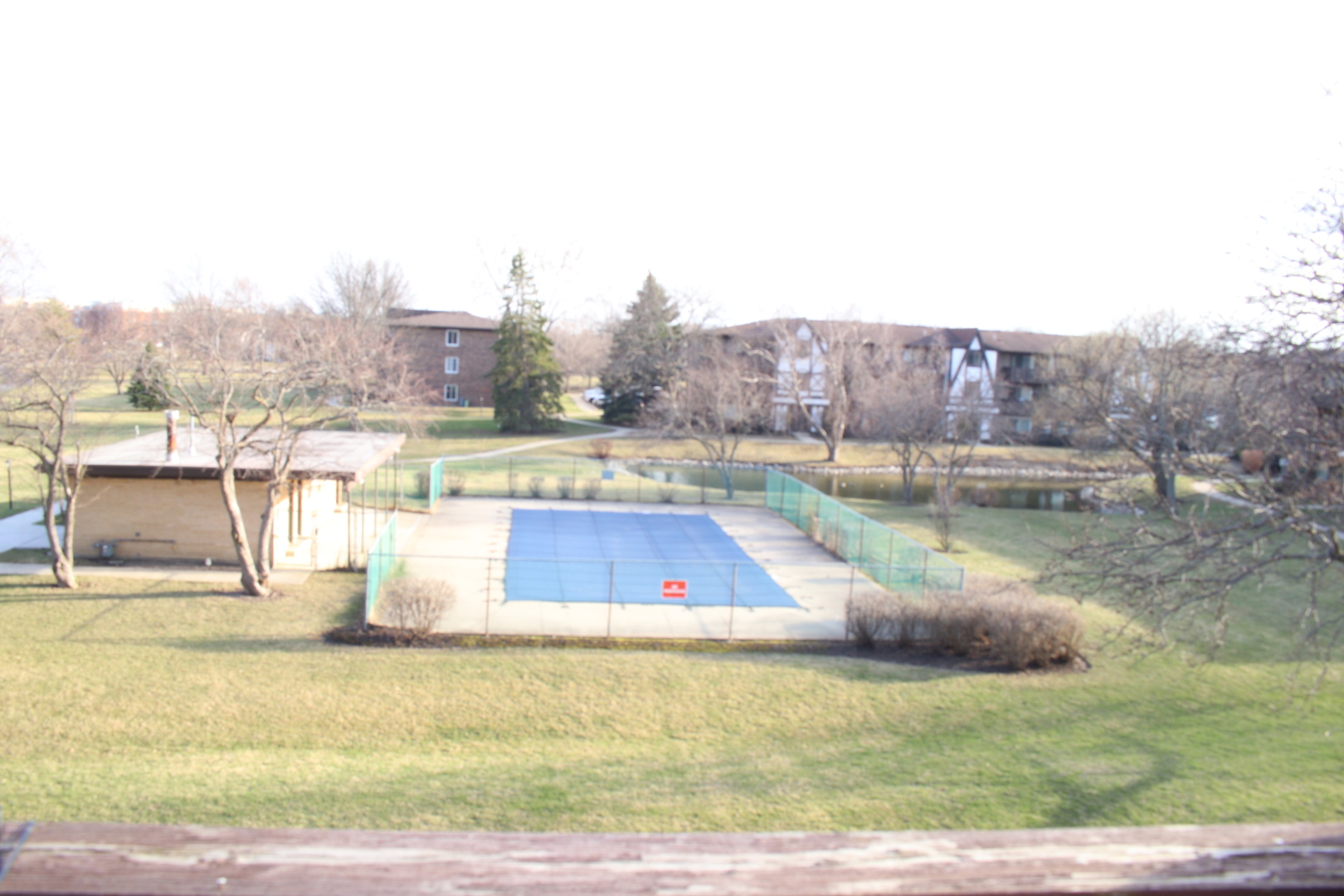 2 Timber Lane, Unit 17 Vernon Hills, IL 60061 - Photo 27 of 28 a view of a swimming pool with a yard
