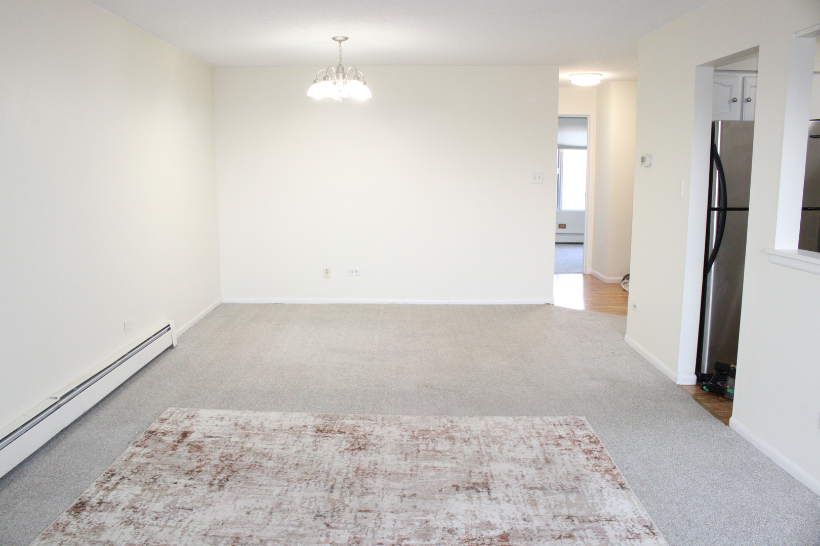 2 Timber Lane, Unit 17 Vernon Hills, IL 60061 - Photo 9 of 28 a view of empty room with wooden floor