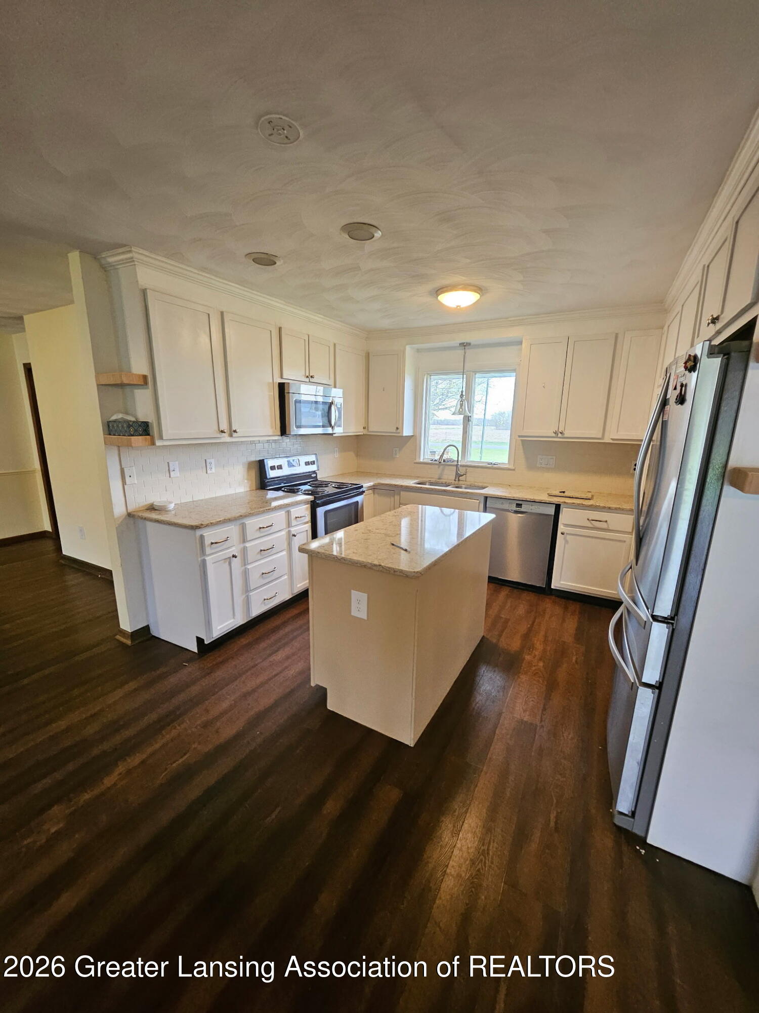 9995 Krouse Road Ovid, MI 48866 - Photo 13 of 30 Kitchen with island