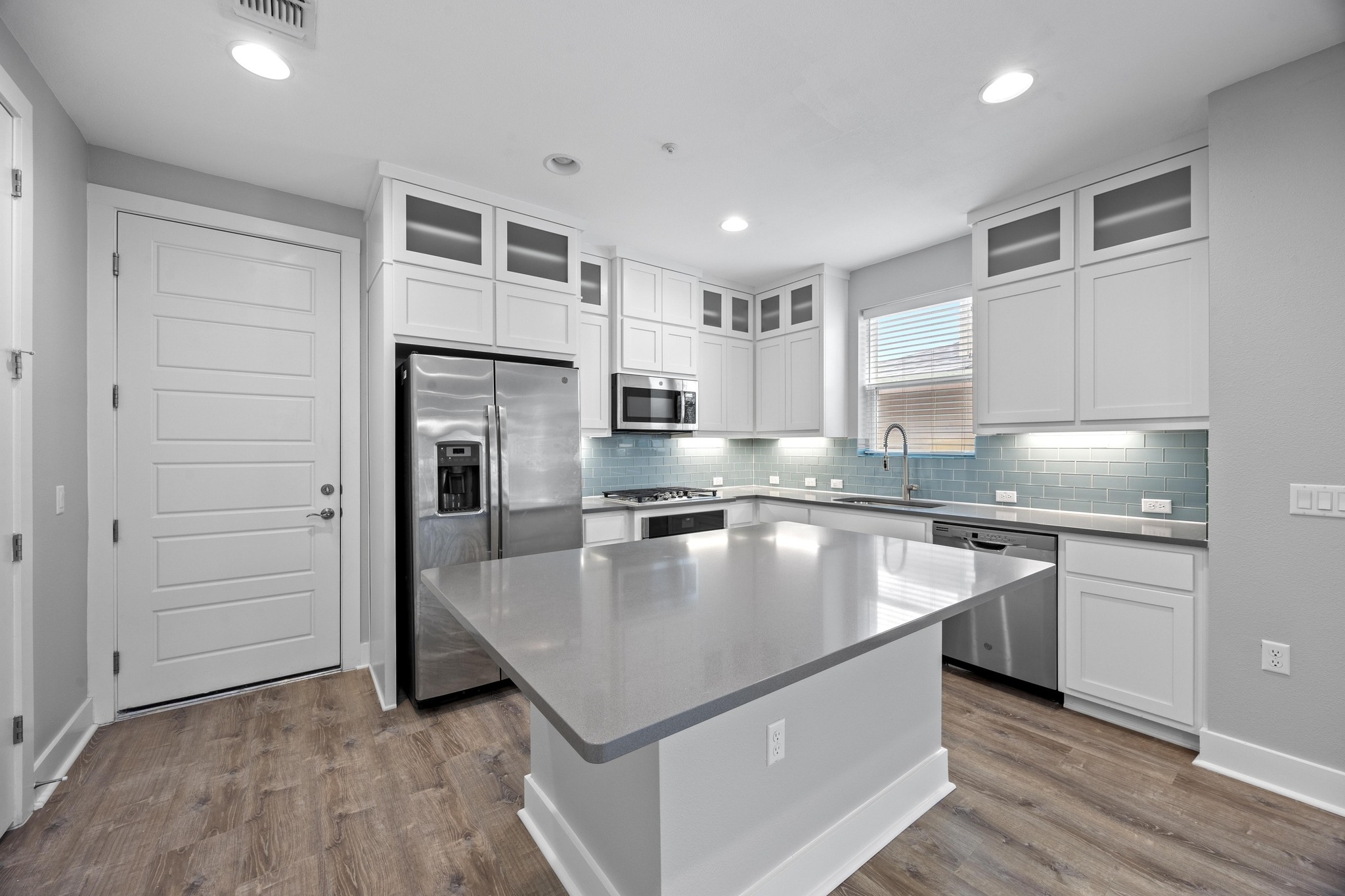 2222 Simond Avenue, Unit E Austin, TX 78723 - Photo 8 of 28 Sizable kitchen island makes for easy food prep.