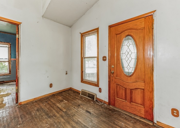 309 North 9th Street Rochelle, IL 61068 - Photo 16 of 23 an empty room with wooden floor and windows