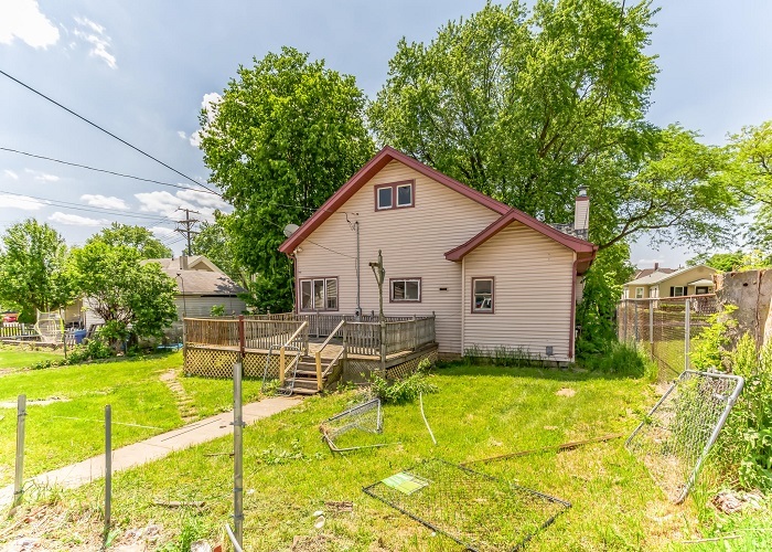 309 North 9th Street Rochelle, IL 61068 - Photo 5 of 23 a view of backyard with swimming pool and seating space
