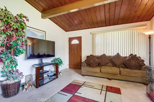 a kitchen with stainless steel appliances a refrigerator and a stove