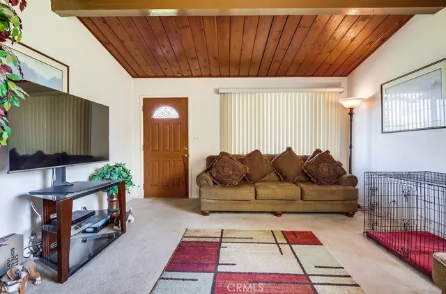 a kitchen with stainless steel appliances a refrigerator and a stove
