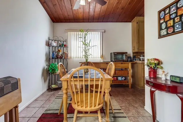 a kitchen with stainless steel appliances a refrigerator a sink a stove and cabinets