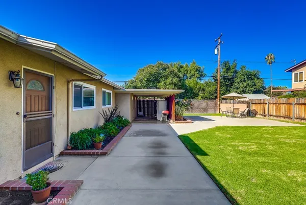 a view of house with outdoor space and entertaining space