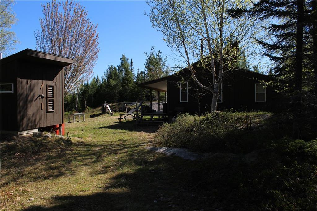 62 Ledge View Road West Forks, ME 04985 - Photo 5 of 33 View of cabin from driveway. ...