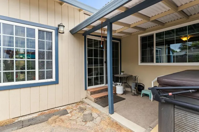 a view of a house with a large window