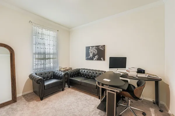 a bathroom with a sink mirror and toilet