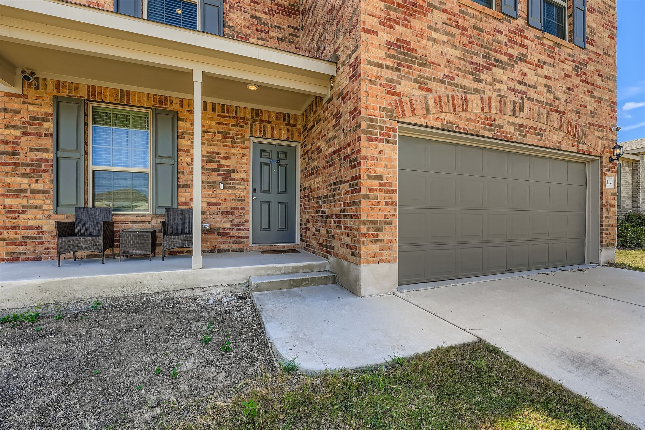 144 Gunther Way Taylor, TX 76574 - Photo 2 of 29 front view of a house with a yard