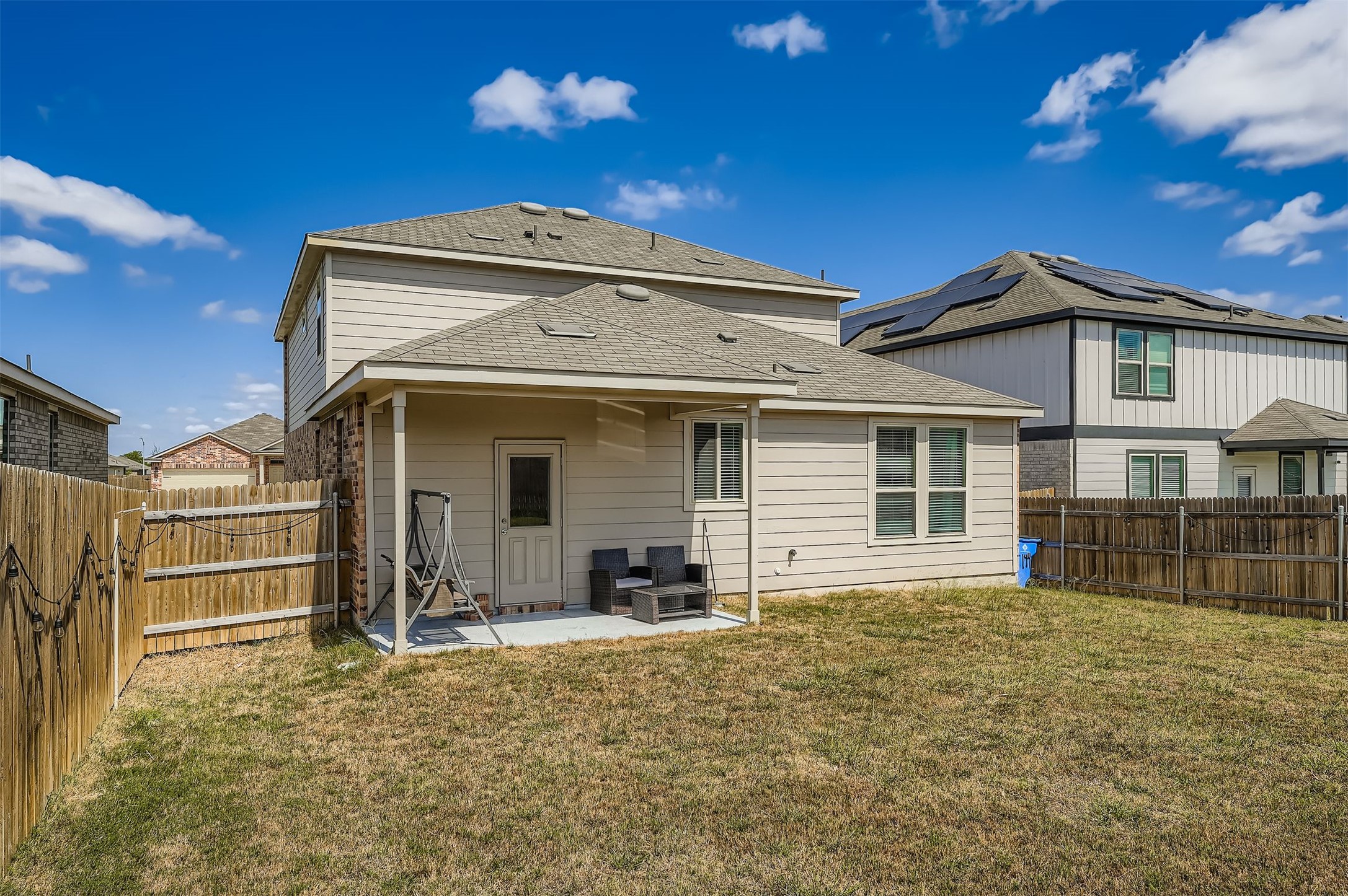 144 Gunther Way Taylor, TX 76574 - Photo 24 of 29 a front view of a house with a yard