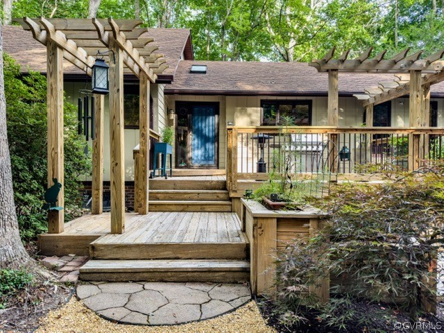 a front view of a house with porch and wooden floor