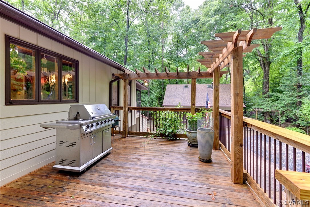 125 Rte 1601 Williamsburg, VA 23188 - Photo 11 of 46 a view of a deck with chair and wooden floor