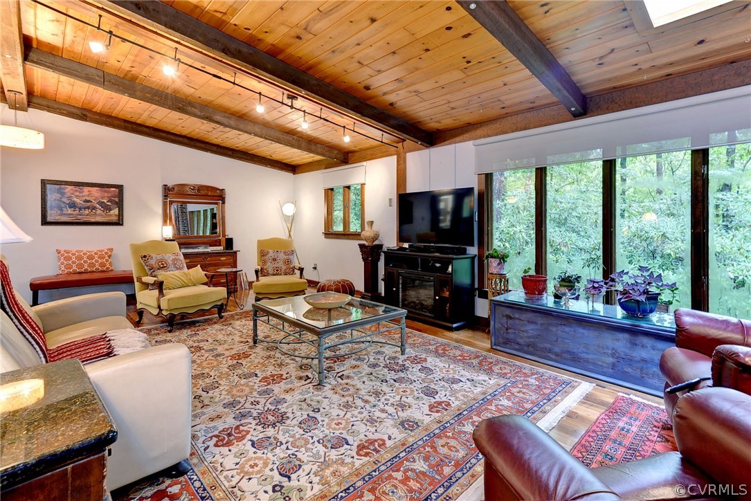 125 Rte 1601 Williamsburg, VA 23188 - Photo 15 of 46 a living room with furniture fireplace and a large window