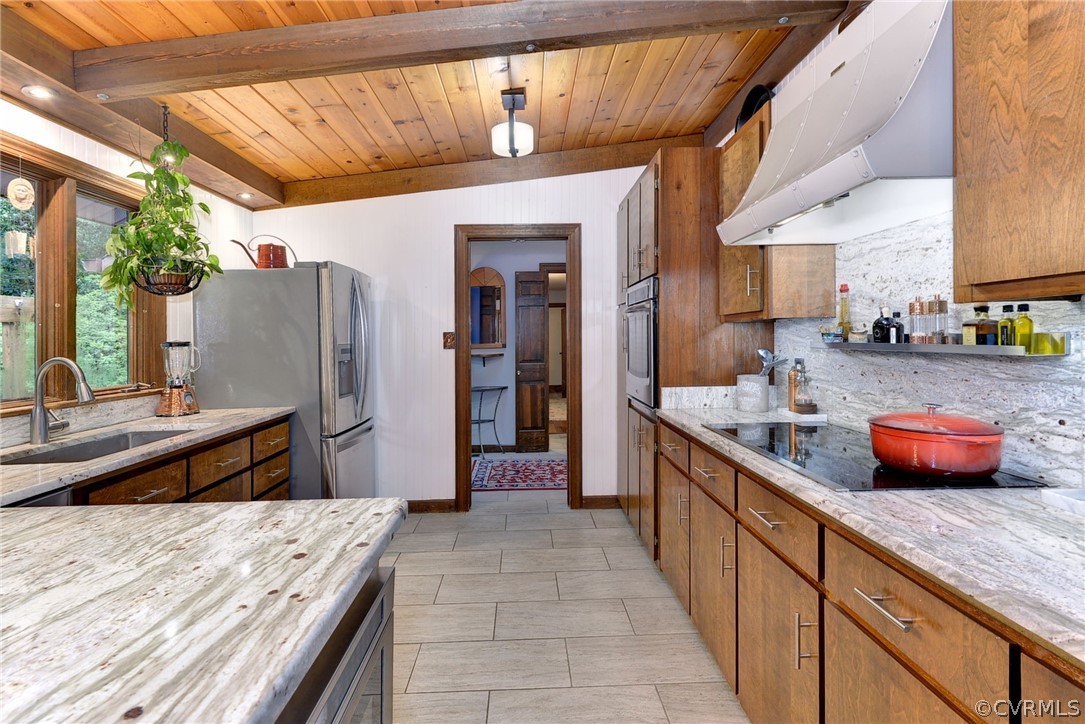 125 Rte 1601 Williamsburg, VA 23188 - Photo 19 of 46 a kitchen with stainless steel appliances kitchen island granite countertop a sink and cabinets