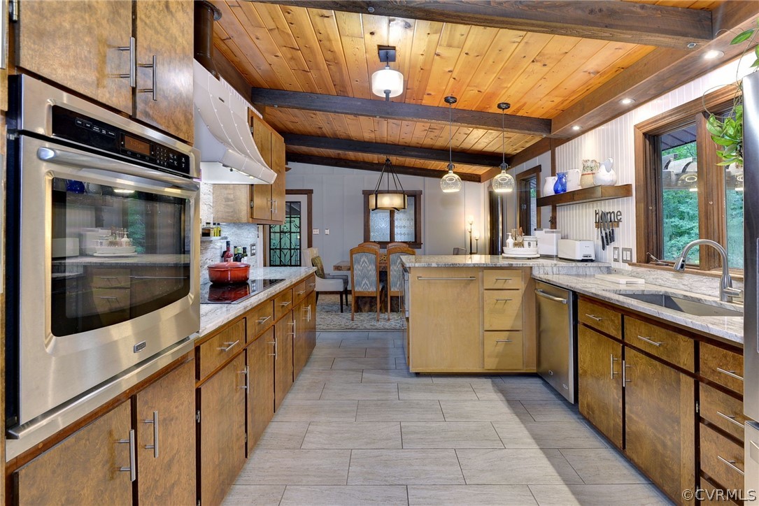 125 Rte 1601 Williamsburg, VA 23188 - Photo 20 of 46 a kitchen with stainless steel appliances kitchen island granite countertop a sink and cabinets