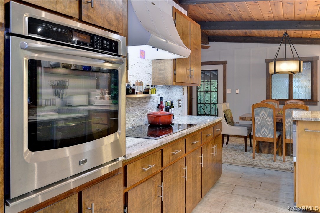 125 Rte 1601 Williamsburg, VA 23188 - Photo 21 of 46 a kitchen with stainless steel appliances kitchen island granite countertop a table and chairs