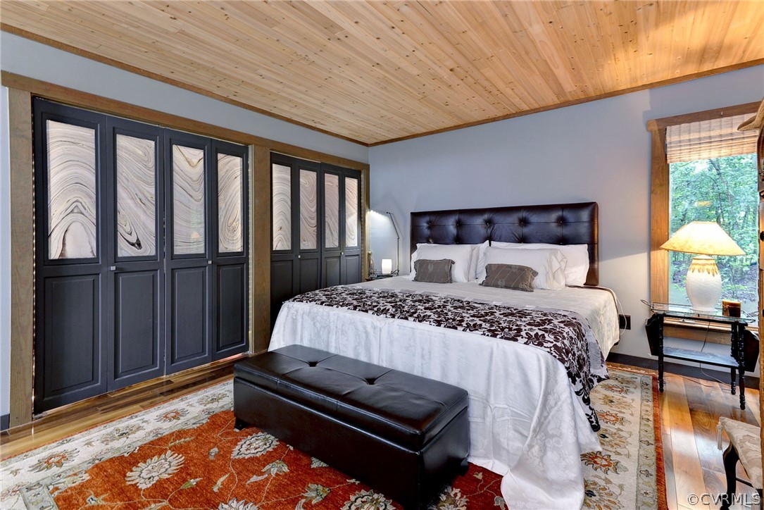 125 Rte 1601 Williamsburg, VA 23188 - Photo 25 of 46 a bed sitting in a bedroom next to a window