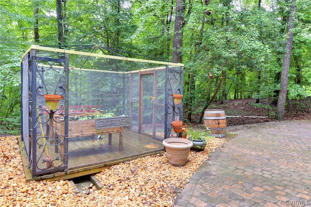 125 Rte 1601 Williamsburg, VA 23188 - Photo 9 of 46 a view of a patio with table and chairs potted plants
