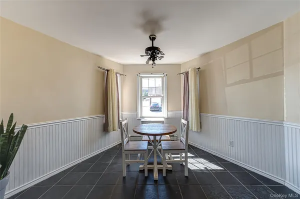 a view of a room with furniture window and wooden floor