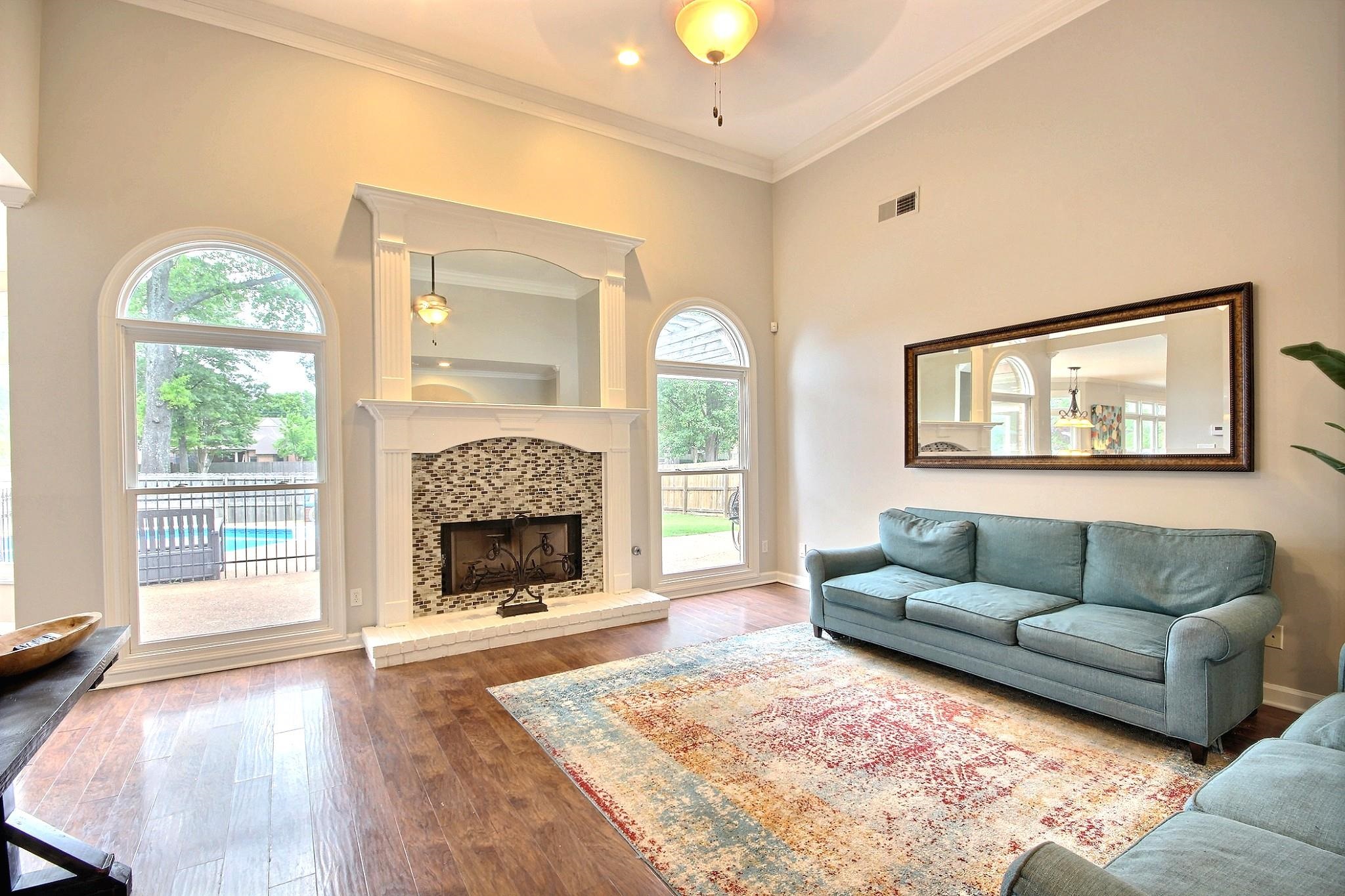 1050 Stanhope Road Collierville, TN 38017 - Photo 6 of 31 a living room with furniture and a fireplace