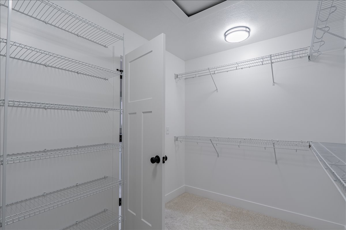 5206 Finlen Lane Bloomington, IL 61705 - Photo 20 of 40 a view of a room with racks on the wall