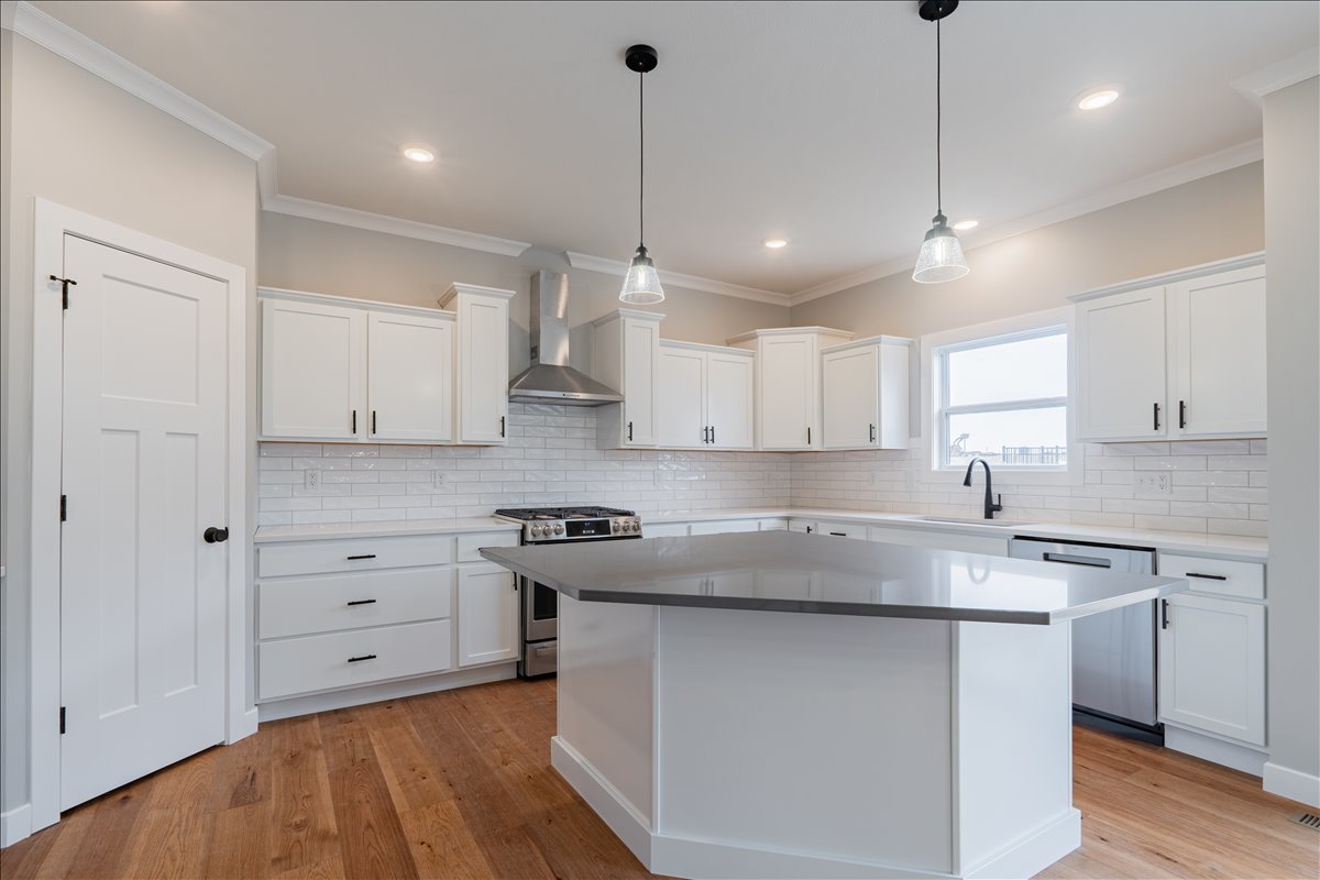 5206 Finlen Lane Bloomington, IL 61705 - Photo 2 of 40 a kitchen with a white cabinets sink and dishwasher