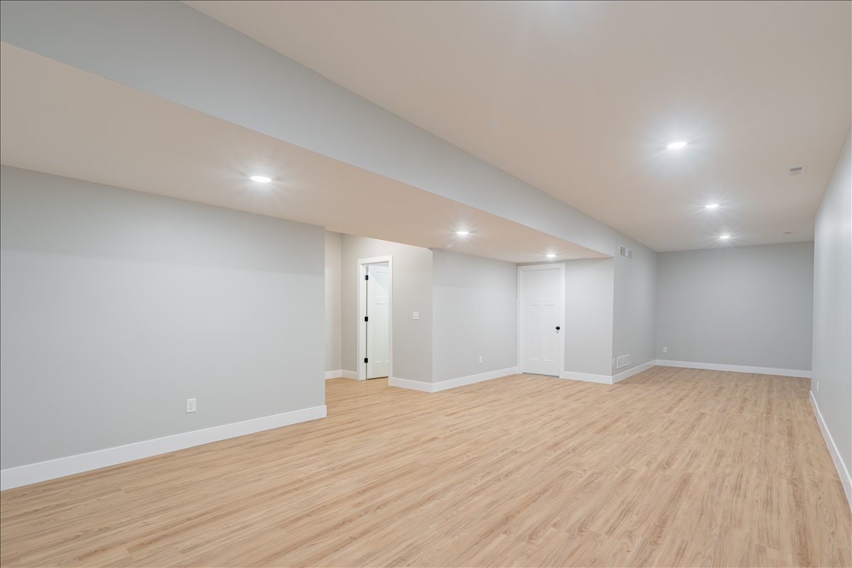 5206 Finlen Lane Bloomington, IL 61705 - Photo 30 of 40 a view of an empty room with wooden floor